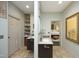 Jack and Jill bathroom featuring dual vanities with granite countertops and access to bedroom at 21 Wedgewood Rd, Chapel Hill, NC 27514