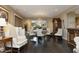 Elegant dining room with hardwood floors, a stunning chandelier, and ample natural light at 21 Wedgewood Rd, Chapel Hill, NC 27514