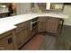 Kitchen with custom wood cabinetry, granite countertops, stainless steel appliances, and an island with seating at 21 Wedgewood Rd, Chapel Hill, NC 27514