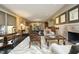 Bright and spacious living room with sophisticated decor, hardwood floors, and a cozy fireplace at 21 Wedgewood Rd, Chapel Hill, NC 27514