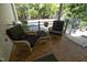 Cozy porch with brick flooring and comfortable seating, perfect for relaxing outdoors at 21 Wedgewood Rd, Chapel Hill, NC 27514