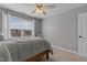 Bedroom featuring bed, ceiling fan, and picture window at 2220 Rainy Lake St, Wake Forest, NC 27587