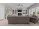 Comfortable living room with fireplace and built-in shelves, perfect for relaxation at 2220 Rainy Lake St, Wake Forest, NC 27587