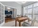 Bright home office with a wooden desk, chair and large window at 2220 Rainy Lake St, Wake Forest, NC 27587
