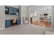 Well-lit playroom featuring custom blue cabinets and desk area, ideal for  at 2220 Rainy Lake St, Wake Forest, NC 27587