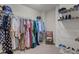 Walk-in closet featuring ample hanging and shelf storage at 2220 Rainy Lake St, Wake Forest, NC 27587
