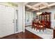 View of the Dining Room with a wood table, china cabinet and a decorative, coffered ceiling at 2739 Elderberry Ln, Apex, NC 27539