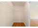 Walk-in closet with wood-look floors and wire shelving, providing ample storage space at 2782 N Shiloh Rd, Garner, NC 27529