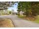 View of the home with a long driveway leading up to it at 2782 N Shiloh Rd, Garner, NC 27529