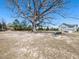 Spacious community area with benches and mature trees for relaxation and enjoyment at 3059 Hyco Lake Ct, Fuquay Varina, NC 27526