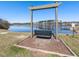 Lakeside swing where you can relax and enjoy beautiful lakefront views and the peace of nature at 3059 Hyco Lake Ct, Fuquay Varina, NC 27526