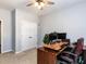 Inviting home office with a large desk, comfortable chair, and ample space for productivity at 3059 Hyco Lake Ct, Fuquay Varina, NC 27526