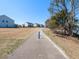 Smooth pathway for residents to walk, run, or bike with beautiful views of the surrounding community at 3059 Hyco Lake Ct, Fuquay Varina, NC 27526