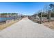 Scenic walking bridge with lake views, perfect for a peaceful walk or bike ride at 3059 Hyco Lake Ct, Fuquay Varina, NC 27526