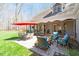Beautiful backyard with a patio, outdoor furniture, and lush green lawn at 3120 A Timberlyne Dr, Mebane, NC 27302