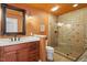 Stylish bathroom with double vanity, tile shower, and modern fixtures at 3120 A Timberlyne Dr, Mebane, NC 27302
