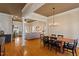 Open floor plan with dining area, hardwood floors, columns and living room at 3120 A Timberlyne Dr, Mebane, NC 27302