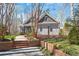 Charming home with landscaped yard, brick stairs, and craftsman style architectural details at 3120 A Timberlyne Dr, Mebane, NC 27302