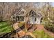 Beautiful home with a brick walkway, lovely landscaping, and covered front porch at 3120 A Timberlyne Dr, Mebane, NC 27302