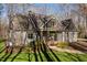 Well-maintained home with a lush green lawn, covered porch, and inviting curb appeal at 3120 A Timberlyne Dr, Mebane, NC 27302