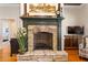 Close-up of fireplace featuring a stone mantel, hearth, and decorative accents at 3120 A Timberlyne Dr, Mebane, NC 27302
