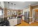 An open kitchen and dining area featuring stainless steel appliances and beautiful outdoor view at 3120 A Timberlyne Dr, Mebane, NC 27302