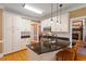 Well-appointed kitchen with granite counters, stainless steel appliances, and white cabinets for a bright, modern feel at 3120 A Timberlyne Dr, Mebane, NC 27302