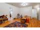 Spacious playroom with hardwood floors and plenty of room for activities at 3120 A Timberlyne Dr, Mebane, NC 27302