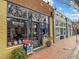 Street view of Blackbird Books and Coffee, showcasing its cozy storefront with a unique display and inviting atmosphere at 319 Fayetteville St # 207, Raleigh, NC 27601