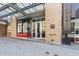 Commercial building entrance with clear glass doors, signage, and brick facade at 319 Fayetteville St # 207, Raleigh, NC 27601