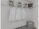 Organized closet space featuring shelving and storage for clothing and accessories at 319 Fayetteville St # 207, Raleigh, NC 27601