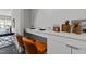 Built-in counter area featuring leather stools at 319 Fayetteville St # 207, Raleigh, NC 27601
