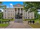 Capitol building with a statue in a park setting at 319 Fayetteville St # 207, Raleigh, NC 27601