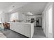 Contemporary kitchen featuring stainless steel appliances, white cabinets, and counter seating at 319 Fayetteville St # 207, Raleigh, NC 27601