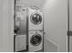 Convenient laundry room with stacked washer and dryer at 319 Fayetteville St # 207, Raleigh, NC 27601