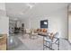 Bright and airy living room featuring modern furniture and concrete floors at 319 Fayetteville St # 207, Raleigh, NC 27601