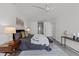Bright bedroom features a ceiling fan and large windows for ample natural light at 319 Fayetteville St # 207, Raleigh, NC 27601