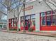 Exterior of Big Ed's Restaurant featuring red trim and cobblestone street, reflecting a historic establishment at 319 Fayetteville St # 207, Raleigh, NC 27601