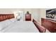 Comfortable bedroom featuring a king bed, dresser, and a view into an en suite bath for added privacy at 4 Teahouse Ct, Durham, NC 27707