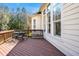 Inviting deck with outdoor seating offers a relaxing space next to bright windows at 4 Teahouse Ct, Durham, NC 27707
