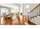 Spacious living room with hardwood floors, open floorplan, and abundant natural light at 4 Teahouse Ct, Durham, NC 27707