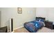 Comfortable bedroom features themed decor, a ceiling fan, and neutral walls at 4532 Draper Rd, Raleigh, NC 27616