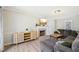 Cozy living room with a fireplace, television, and plenty of seating at 4532 Draper Rd, Raleigh, NC 27616