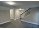 The basement features hardwood flooring and stairs at 512 Texas Ave, Burlington, NC 27217