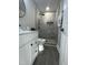 Beautifully remodeled bathroom with a glass-enclosed shower and modern fixtures at 512 Texas Ave, Burlington, NC 27217