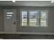 Sun-filled living room with large windows and a view of the outdoors at 512 Texas Ave, Burlington, NC 27217