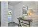Welcoming hallway with an area to drop your keys and a view to the covered porch at 523 N Main St, Graham, NC 27253