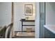 Light-filled hallway with white shiplap walls and a decorative rug at 523 N Main St, Graham, NC 27253