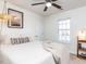Bright bedroom featuring a comfortable bed, ample natural light, and cozy decor at 543 Chatham Forest Dr, Pittsboro, NC 27312