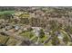 An aerial view of a lovely home nestled among lush trees in a peaceful neighborhood at 5437 Grasshopper Rd, Raleigh, NC 27610